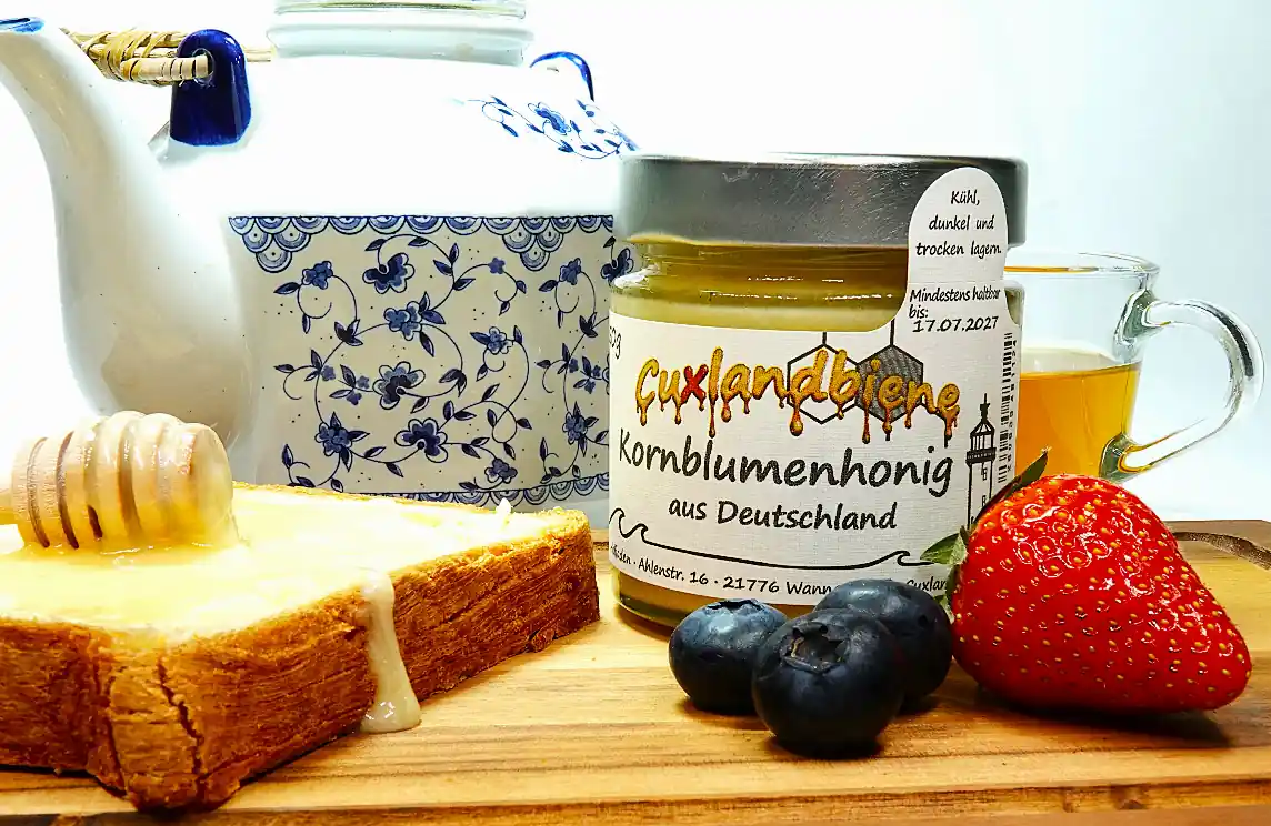 Kornblumenhonig cremig 250g auf Gedeck 2