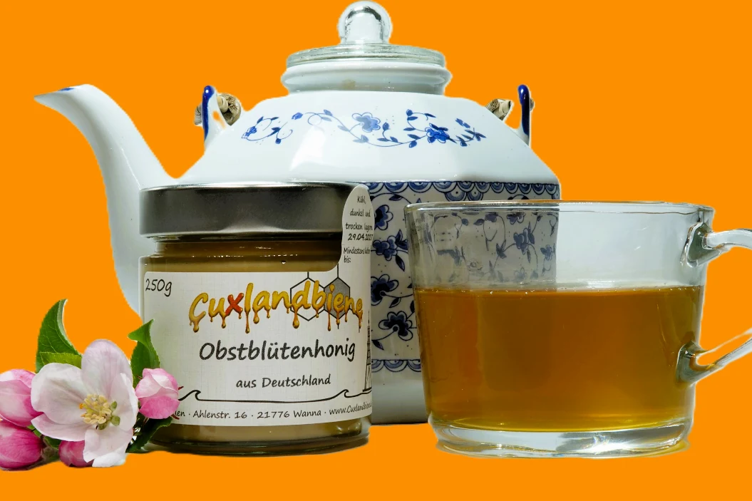 Obstbluetenhonig 250g auf Gedeck - Orange